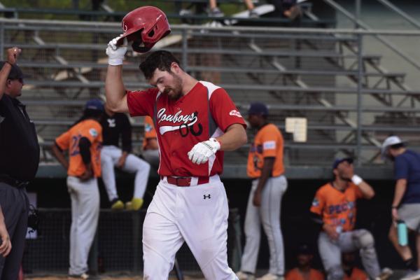 Cowboy batter, Tommy Kretzler, at a recent game against the Bills. Photo by Julie Myers