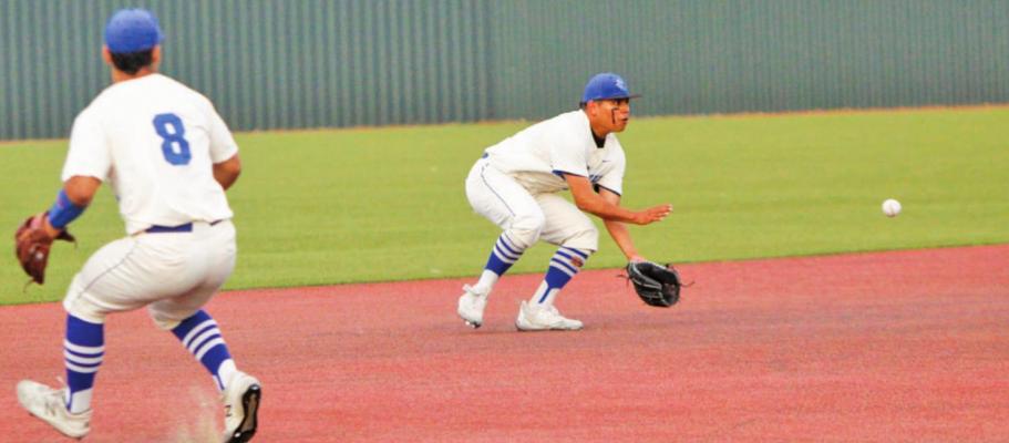 Daren Ureste, right, attempts to haul in a groundball during the Panthers home contest against Pecos on April 19. Ureste will be one of many starters that have the opportunity to return to Fort Stockton’s starting lineup next season. Photo by Nathan Heuer