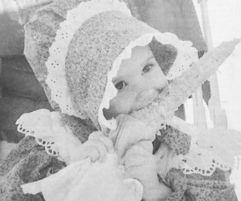 Seventeen-month-old Kaylee Cope of Fort Stockton sinks her budding teeth in an ear of roasted corn during Living History Days 1998. Over the two days of the event, thousands of visitors, including school children from across West Texas, enjoyed a trip back in time on the grounds of Historic Fort Stockton.