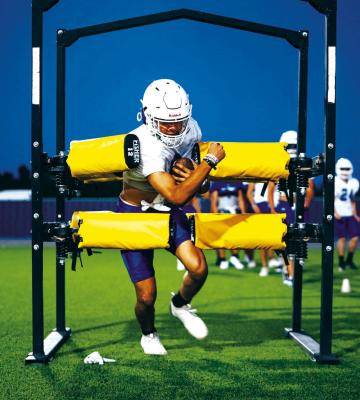 Panther football player, Alonso Galindo powers through a running back gauntlet during a recent practice. The drill helps athletes practice securing the football, maintaining balance, and protecting the ball while simulating contact with defenders. Photo Courtesy of Fort Stockton Football