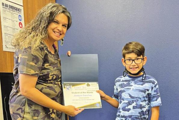 Fifth grader Joaquin Sanchez was named Intermediate Student of the Month for April at the school board’s regular meeting on April 27. Assistant Superintendent Amanda Urias presented the certificate. Courtesy Photos