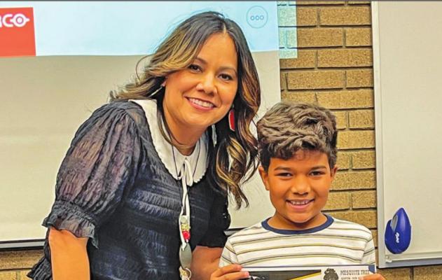 First grader Elijah Ruiz was honored as Apache Student of the Month by Apache Principal Karina Pacheco.
