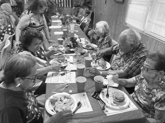 A crowd gathers at the Senior Center. This month’s potluck will be a holiday party to celebrate the season. Courtesy Photo