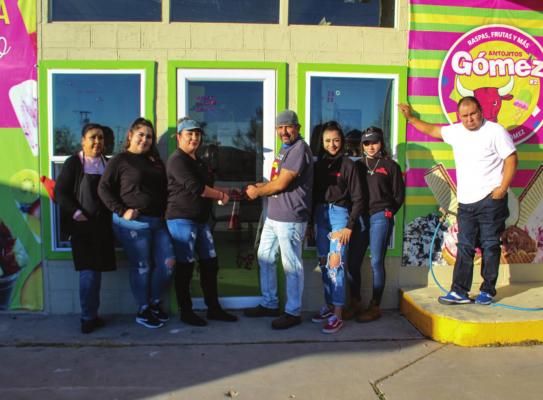 Antojitos Gomez held a ribbon cutting ceremony on Friday, Jan. 22. Pictured from left to right: Dona Lopez, Desiree Gomez, Sonia Gomez, Sergio Gomez, Janeth Landeros, Alexa Landeros, Alonzo Gaitan. Photo by Nathan Heuer