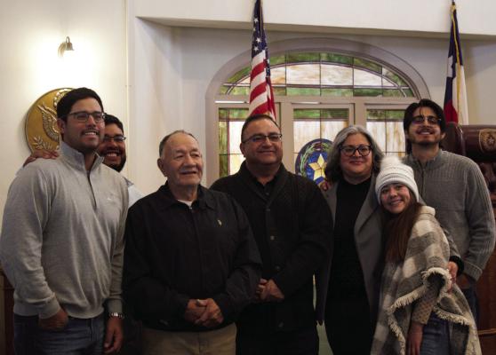 Pct 1 Commissioner, Francisco Ramirez, stands with his family after the Jan. 1 Pecos County ceremony.