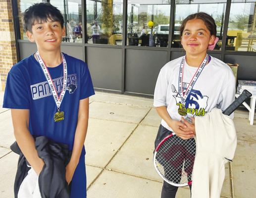 Daniel Hernandez and Alexsandra Navarrette (7th Grade Mixed Doubles 1st Place Champions).