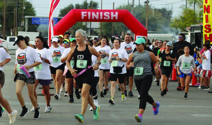 On Saturday, the Barrio Fest celebration was kicked off by the 5K run when course runners meandered through historic downtown Fort Stockton and around the picturesque James Rooney Memorial Park. Photo by Tristian Barragan