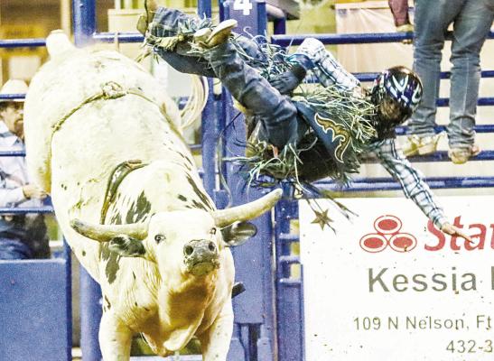 Jacob Carige is bucked off his bull during the 2023 Comanche Springs Rodeo at the Pecos County Civic Center. The 2024 Comanche Springs Rodeo is March 21-23 with more activities in store. File Photo by Shawn Yorks