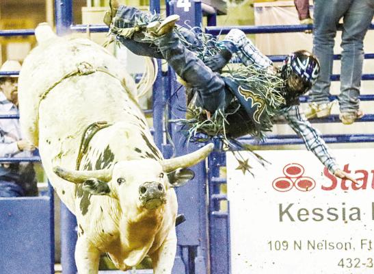 Jacob Carige is bucked off his bull during the 2023 Comanche Springs Rodeo at the Pecos County Civic Center. The 2024 Comanche Springs Rodeo is March 21-23 with more activities in store. File Photo by Shawn Yorks