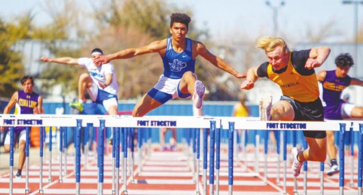 Fort Stockton junior Zane Hodges, middle, clears a hurdle in the 110-meter high hurdle race at the Comanche Relays on Feb. 26. Hodges took second at the event in Fort Stockton and won the event last week at the Sandhills Relays.