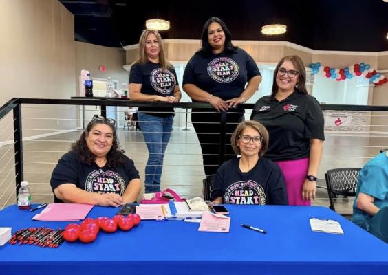 Head Start staff show eagerness to extend their program for the community’s youth at the Neighbor to Neighbor event at the Convention Center in Fort Stockton.