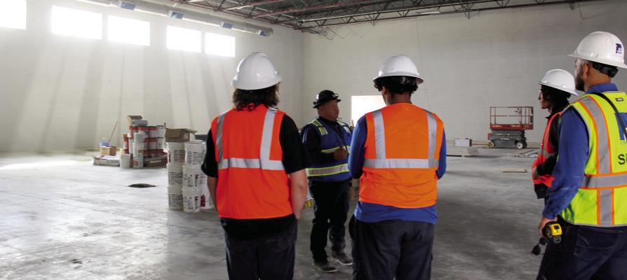 Assistant superintendent and head of operations Gil Rey Madrid gave a walkthrough of two of FSISD’s current construction sites, explaining the advancements and improvements the facilities will provide the students. Photo by Joh Covington