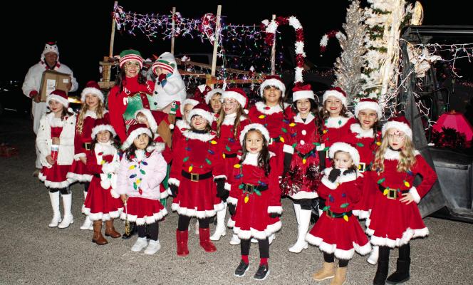 Named as the parade’s Best in Walking, the Candy Cane Dancers showed up for the Fort Stockton Christmas Parade shining as bright as lights on a Christmas tree. More photos on page 14. Photo by Tristian Barragan