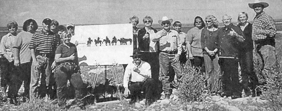 October 2009 issue: Midland oilman Clayton Williams and artist Brian Norwood stand with well-wishers Sept. 30 near the site about two miles west of Fort Stockton where a set of silhouettes promoting tourism in the city will be constructed. Williams is allowing the land to be used for the silhouettes, which will be created by Norwood. Another set of silhouettes is also planned for east of Fort Stockton. Well-wishers gather on the site that will soon host 16-foot by 90-foot silhouettes of native riders. The l