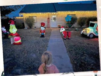 Winning Bronze, with the third-most in polling, is this fun-filled yard filled with glowing characters that look ready for a hug or two. Courtesy Photo