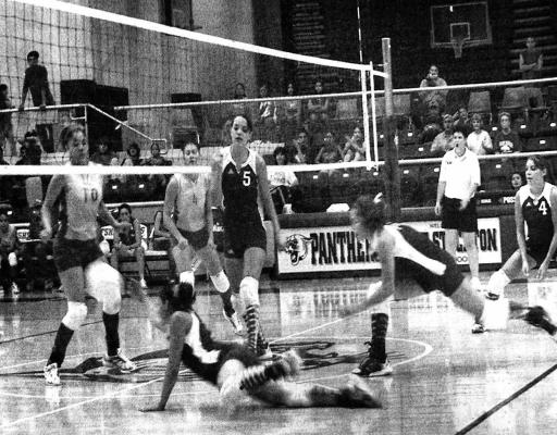 August 2005 - A Prowler player lays out for the ball during the team’s home season opener against the New Mexico Eagles at the Williams Special Events Center Tuesday night. The Prowlers were victorious, sweeping the Eagles in three straight games. The team heads to Odessa for a tournament this weekend.