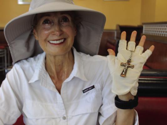 Edie Sundby shows off a gift she received from a concerned traveler.