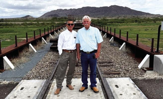 Presidio County Judge Joe Portillo and Pecos County Judge at the railroad Bridge crossing between Ojinaga, Mexico and Presidio, Texas.
