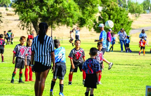 Players, coaches and referees fill multiple fields at Rooney Park during the opening day of Fort Stockton’s youth soccer season Saturday, Aug. 22. The four-week season drew 150 children across 20 teams. Pioneer Photo by Tristian Barragan