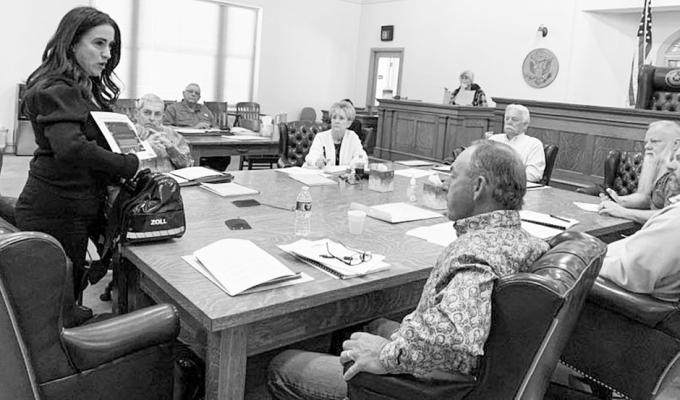 Lavern Smith, from Zoll Medical Corporation, gives a presentation to the Pecos County Commissioner’s Court on Monday morning. The court purchased a defibrillator from the company to be placed in its ambulances. Photo by Shawn Yorks