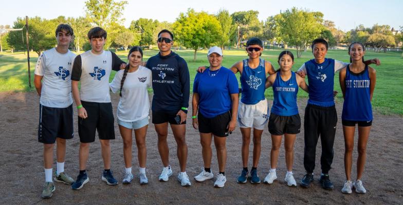 Fort Stockton High School cross country runners gather in front of a memorial honoring former teammate Eddie Vela during the inaugural Eddie Vela Memorial 5K on Saturday at Rooney Park. Vela, a Panther sophomore and varsity cross country runner, was remembered by family, friends, classmates and teammates during the event, which raised funds for student grief support and safe driving awareness. Courtesy Photo
