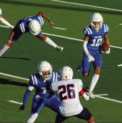 Junior Varsity Panther Alonso Urias takes the ball up the field. Photo by Anthony Urias