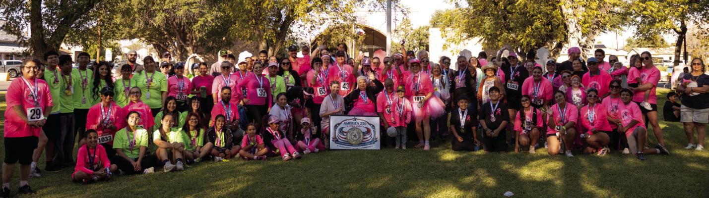 Community members gather for the Stronger Together Pink Out 5K and Expo Oct. 10 at Zero Stone Park in Fort Stockton. The annual Pink Springs fundraiser supports individuals and families impacted by breast cancer. Courtesy Photo by Laura Waddell Photography.