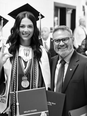 Rylee Weist and Dr. Adrian Vega, Vice President of Institutional Advancement, stand outside for a photo. Photos by Andres Madrid