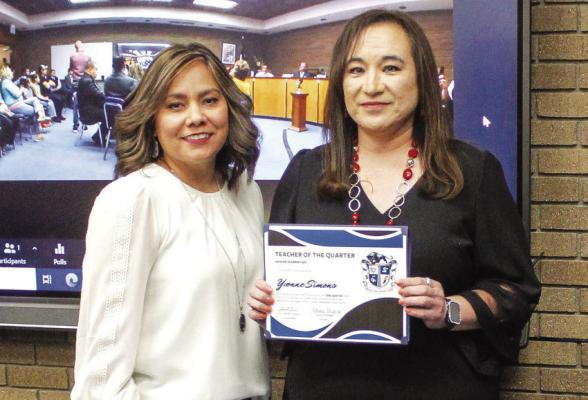 Yvonne Simons was named the Apache Elementary Teacher of the Quarter on March 27. Simons teaches first grade following a lengthy tenure as a kindergarten teacher. Apache Elementary Principal Karina Pacheco presented Simons the award and introduced her to the audience, board, and superintendent.