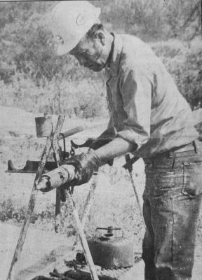May 1987 - TRANS-PECOS SSC SITE CORE SAMPLES - Jim Krumnow, an experienced core driller for Pennzoil Sulfur [formerly Duval Corp.] of Carlsbad, N.M., supervised the core drilling operation performed for the Trans-Pecos Superconducting Super Collider steering committee in Pecos and Reeves Counties last week. [Pioneer Photo]