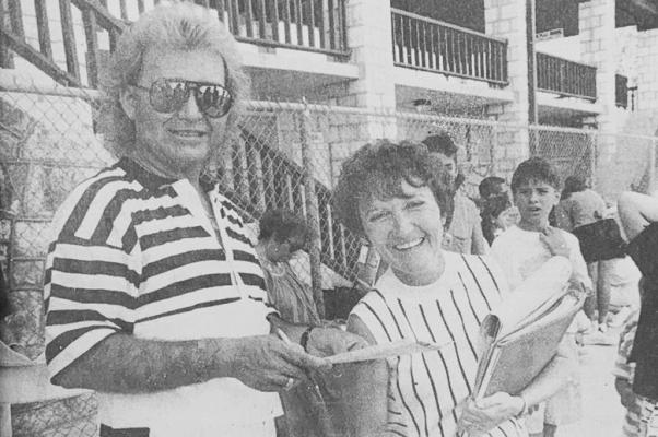 MAY 1989-GETTING READY FOR WATER CARNIVAL are the 1989 show’s directors, Hector Suarez and Kay Handley. They were busy signing up people Sunday afternoon at the general meeting for performers and workers held at Comanche Springs Swimming Pool. (Pioneer Photo)