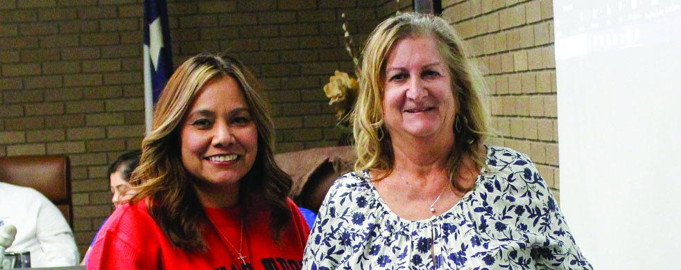 Apache Teacher of the Quarter, Vivian Hickman, right, was recognized at Monday’s school board meeting by principal Karina Pacheco. Not pictured is Alamo Teacher of the Quarter Becky Rojas.