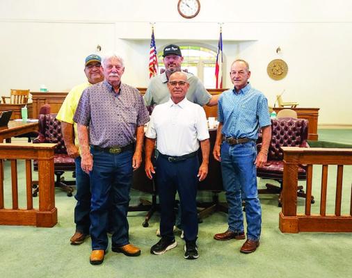 Pct 1 Commissioner Francisco Ramirez (left), County Judge Joe Shuster, Pct 4 Nathan Reeves (back), Fort Stockton City Councilmen and future Pct 2 Commissioner Paul Jerome Chavez (front), and Pct 3 Commssioner Mickey Jack Perry. Photo by Joh Covington