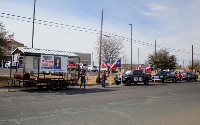 District Clerk candidates and representatives for Justice of the Peace Pct. 1 candidate Ruben Salinas lined Nelson Street outside of the Pecos County Courthouse Annex on March 1, encouraging citizens to vote on election day. The location was building that hosted voters for Pct. 2 on election day and early voters leading up to the election. Photo by Nathan Heuer