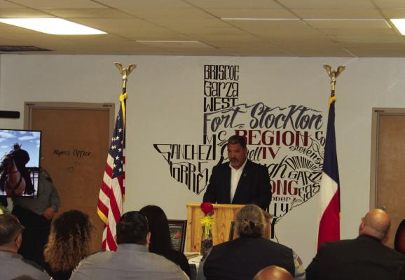 City Manager Frank Rodriguez III delivers the keynote speech during this year’s Texas Department of Justice’s Annual Memorial Service. Fort Stockton officers and the public and the Fort Stockton Middle School Band and Choir were on hand to salute the brave. This annual event includes a roll call of those fallen in the line of duty as well as a riderless horse, the lighting of a memorial candle, the playing of Taps, and more.