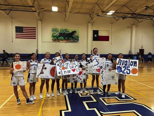 The 8th grade blue team cemented their legacy as one of the school’s best with a perfect 13-0 record this season, led by coach Humberto Renteria. Photo by Becky Rojas