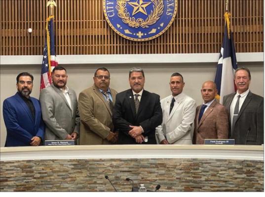 The Fort Stockton City Council stand together after the meeting on Tuesday evening where three members were sworn in for another term. Courtesy Photo