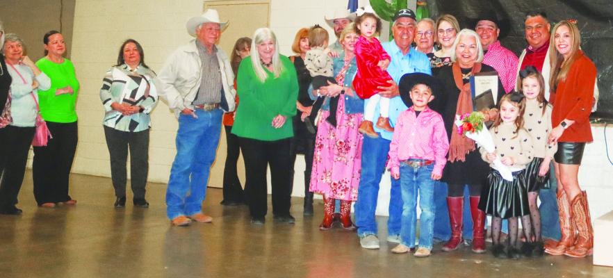 The family of Elsa Ramos, 2023 Outstanding Citizen of the Year, gathers after Ramos received her award.