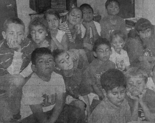 October – 2007 – Luis Dominguez holds the picture of the New York Fire House sent to the second graders at Alamo by the firemen to whom they sent a poster. With Luis, are Tristan Barragan, Amanda Knowles, Alexia Rivera on the front row; Darion Vasques, Jacob Short, Zachary Esparza, Kimberly Leyva, Kendall Lopeza on the middle row, and Cody Wolfe, Allysa Simons, Veronica Navarrette, Amber Corral, Javier Benavides, Alonso Corral on the top row.