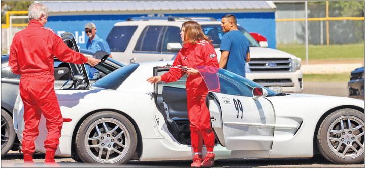 Michael Frazier and Carol Barnes arrive back at Rooney Park on Saturday after completing their run in Car 99, a 1999 Corvette. They completed the course with an average speed of 105.046 mph. Photo by Shawn Yorks