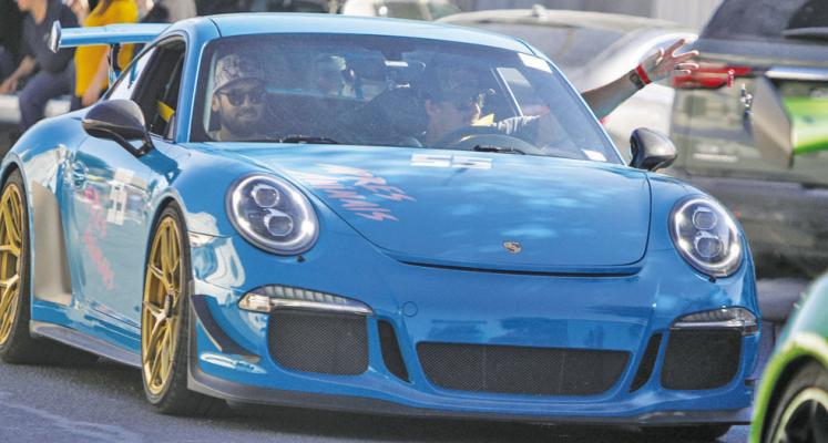 Nick Langcamp and Mike Leighton ride in their 2015 GT3 during the Big Bend Open Road Race Parade on Main Street on April 21.