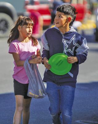 The Big Bend Open Road Race provided area youngsters opportunities to secure an array of items given out by BBORR participants.
