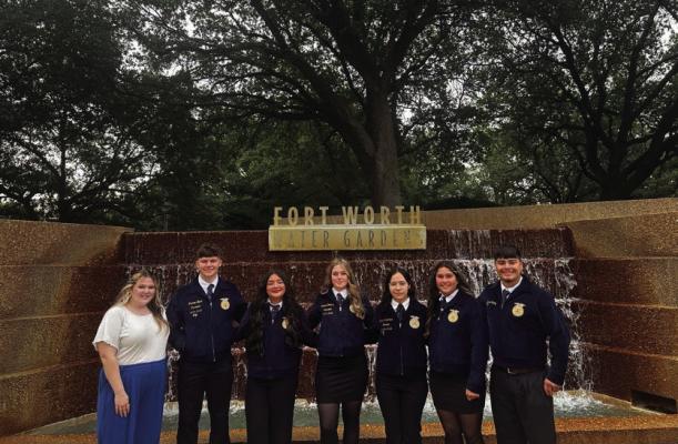Pictured at the Fort Worth Water Garden from left to right, Advisor Crystal Galindo, Andrew Black, Lorena Castillo, Brenna Downing, Karla Villaneuva, Bella Espino, and Daniel Perez.