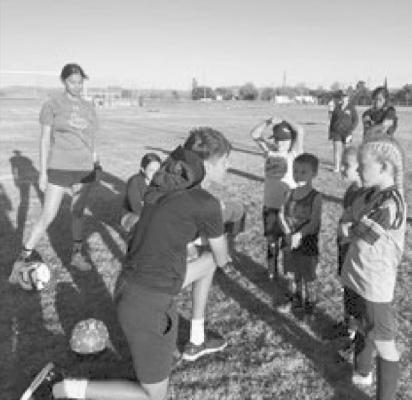 Sul Ross soccer team members coach local youth at weekly clinics. Courtesy photo