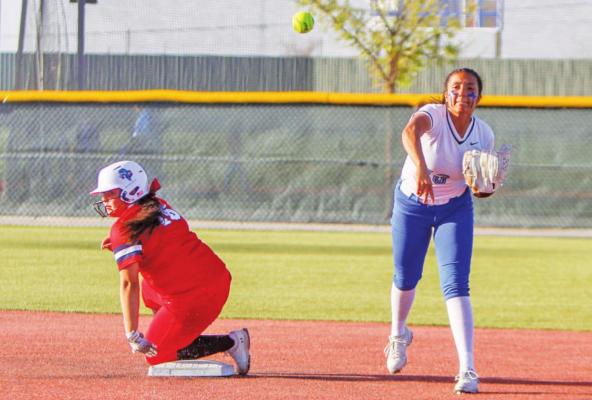 Fort Stockton senior Alyana Dominguez attempts to turn a double play on April on the Prowlers home field against Greenwood. Photo by Nathan Heuer