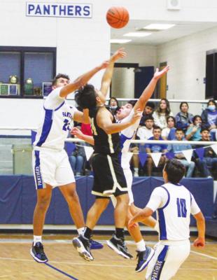 Fort Stockton’s Ethan Acosta, left, and Dominic Aguilar, middle, breakup an attempted Lamesa pass, which resulted in a turnover. Photos by Nathan Heuer