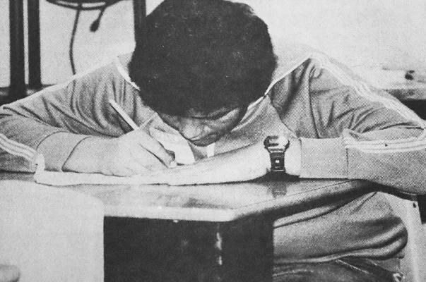 CLOSE TO HIS WORK – Frank Sanchez, who placed second in the math contest during the first L.D. Invitational Literary Meet at Fort Stockton Middle School, gets into the spirit of the academic competition.