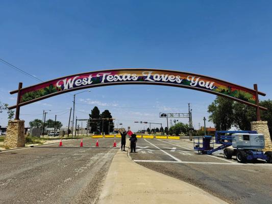 In partnership with muralist Juan Velasquez and local artist Armando Aguirre of Arte Mando (pictured), the Fort Stockton Convention and Visitors Bureau has updated not only Paisano Pete with a new look, but the “Historic Fort Stockton” Arch as well. Courtesy Photo