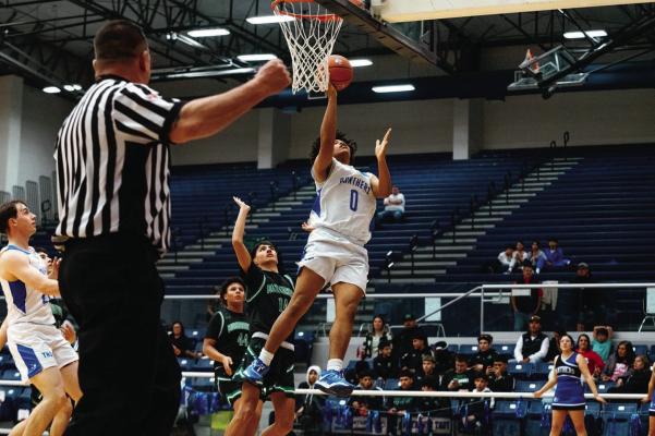 Player Aundre Washington set the tone with a game-high 22 points and six rebounds, when the Fort Stockton Panthers delivered a commanding performance against the Monahans Loboes Friday night. Winning 99-32, the Panthers bounced back in dominant fashion after their tough road loss to Seminole earlier in the week. Story on 6. Photo by Aaron Owens
