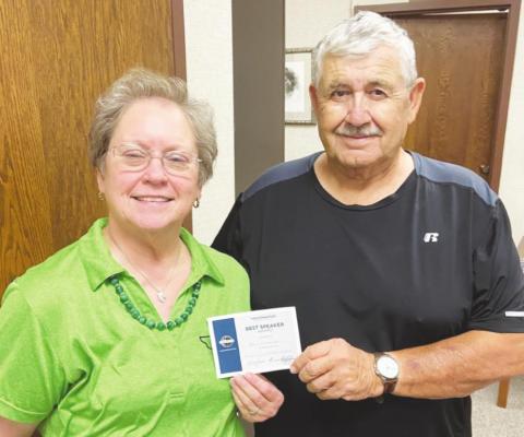 Oscar Gonzalez was presented the Best Speaker Award by Karen Heffelfinger. Courtesy Photos